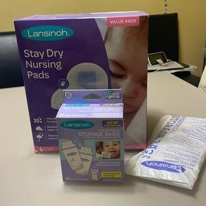 Bundle: Nursing supplies. 200+ stay dry nursing pads and breastfeeding cover